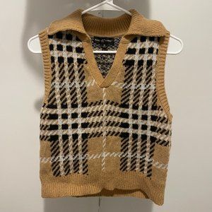 Brown, black and white sweater vest